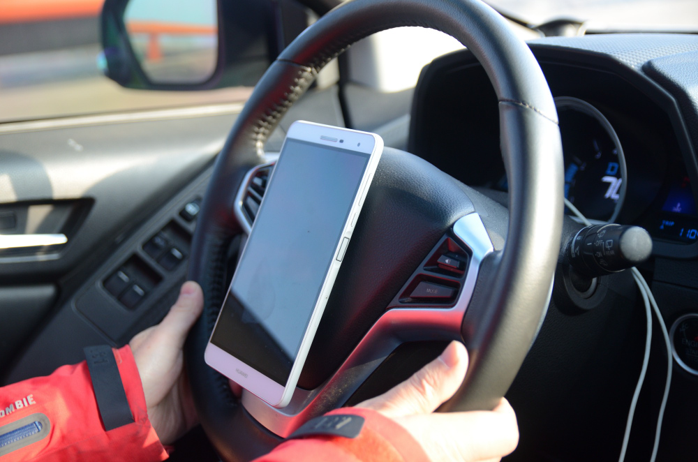 Uchwyt na telefon - na kierownicy - zdjęcia z Chin